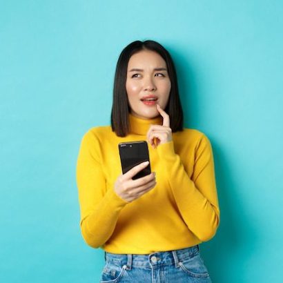 Woman thinking why choose Mr Window Cleaning
